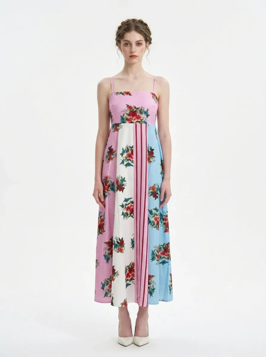 Woman wearing a colorblock floral print maxi dress with spaghetti straps