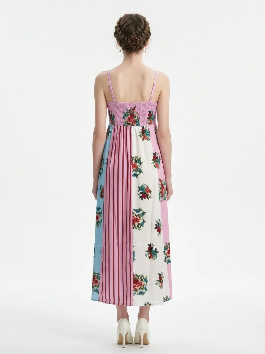 Woman wearing a colorblock floral print maxi dress with spaghetti straps