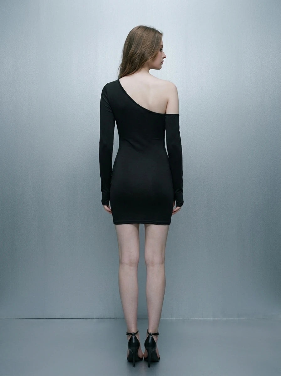 Back view of a woman in a black asymmetrical mini dress with one long sleeve.