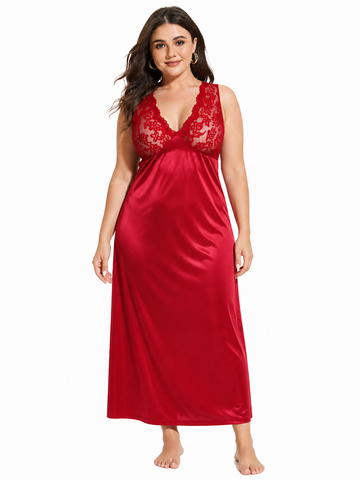 Woman wearing a red satin nightgown with lace detailing on the bust and back.