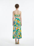 Back view of a strapless floral print midi dress