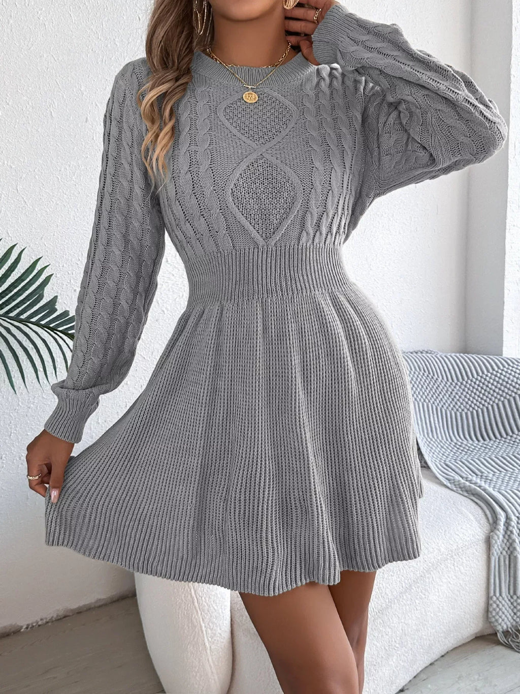 woman wearing a cable knit A-line sweater dress - View 16 | WEUXS