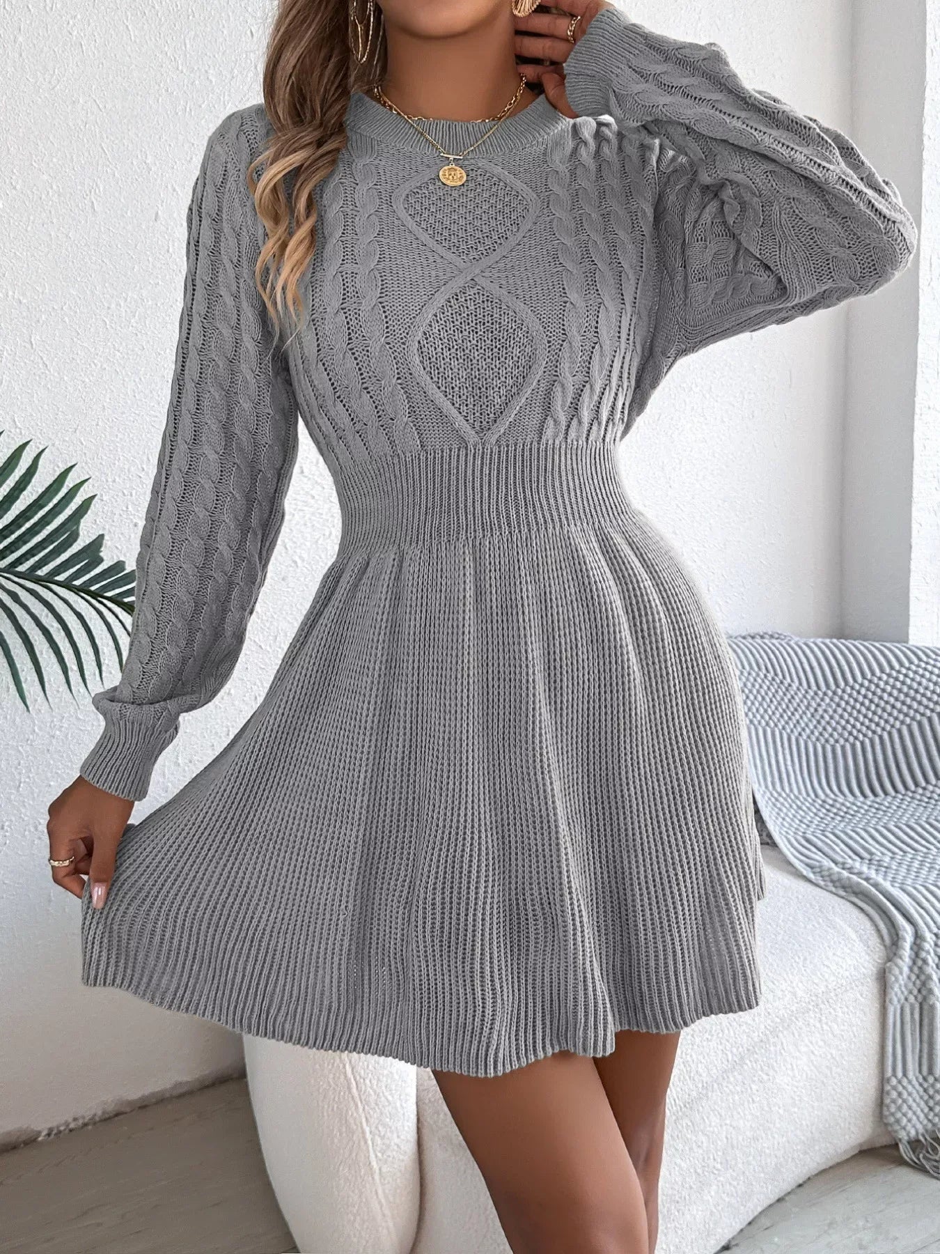 woman wearing a cable knit A-line sweater dress - View 16 | WEUXS