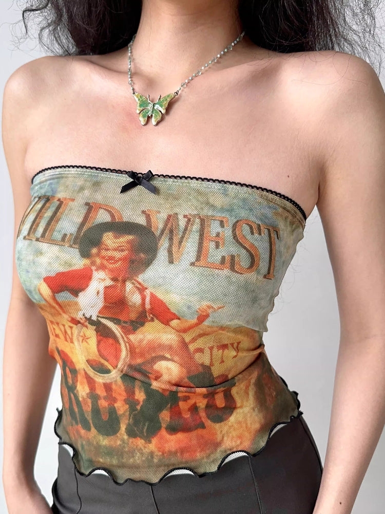 Close-up of the graphic print on a strapless tube top featuring a cowboy illustration.