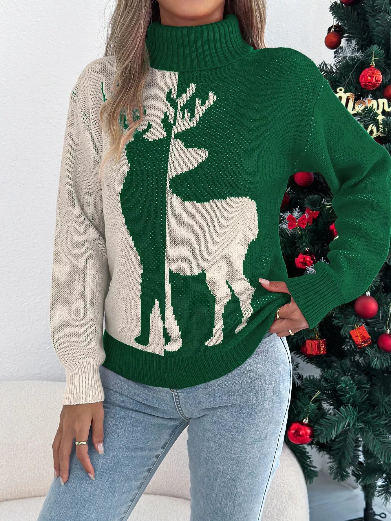 Model posing in a color block holiday sweater