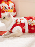 Cat lying down wearing a red festive vest dress with embroidered dragon motif
