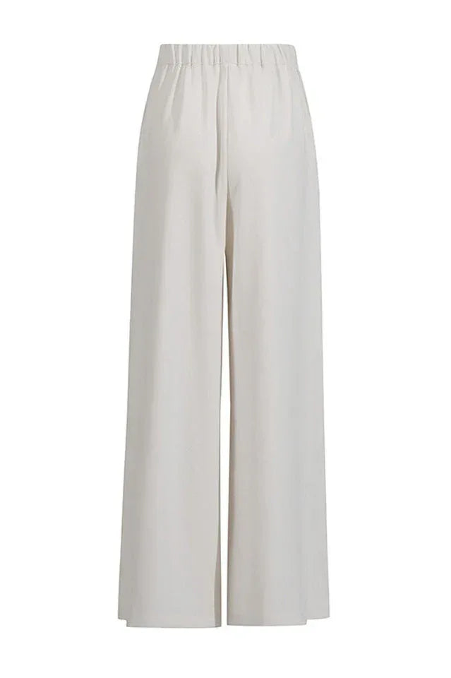 Wide leg pants set with draped cape sleeves and halter neckline - View 12 | WEUXS