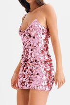 Detail of the sequin embellishment on a pink mini dress