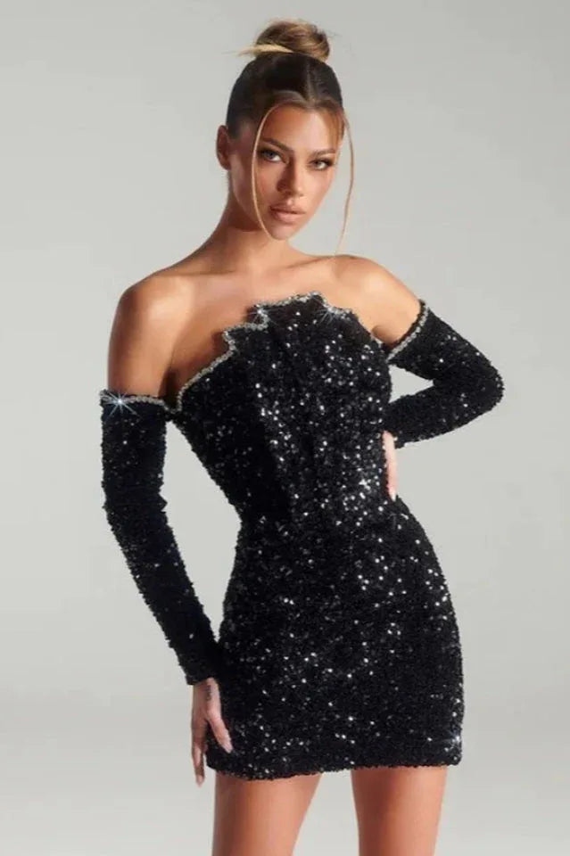 Woman wearing a black sequined off-the-shoulder mini dress with long sleeves. Main image