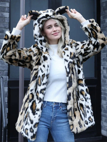 Woman wearing a leopard print faux fur hooded jacket with ears