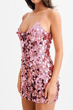 Side view of a pink sequined party dress
