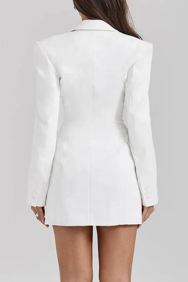 Back view of a white double-breasted blazer dress with a tailored silhouette.