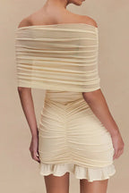 Back view of cream off-the-shoulder ruched bodycon dress