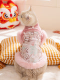 Rear view of a cat wearing a pink traditional Chinese inspired pet vest with faux fur trim and floral embroidery.