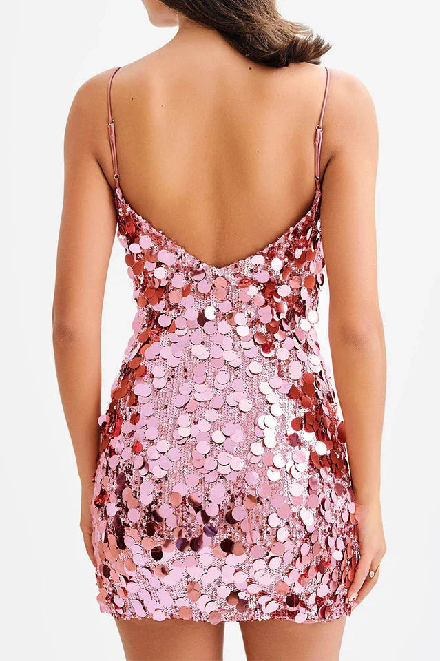 Back view of a pink sequined v-neck dress