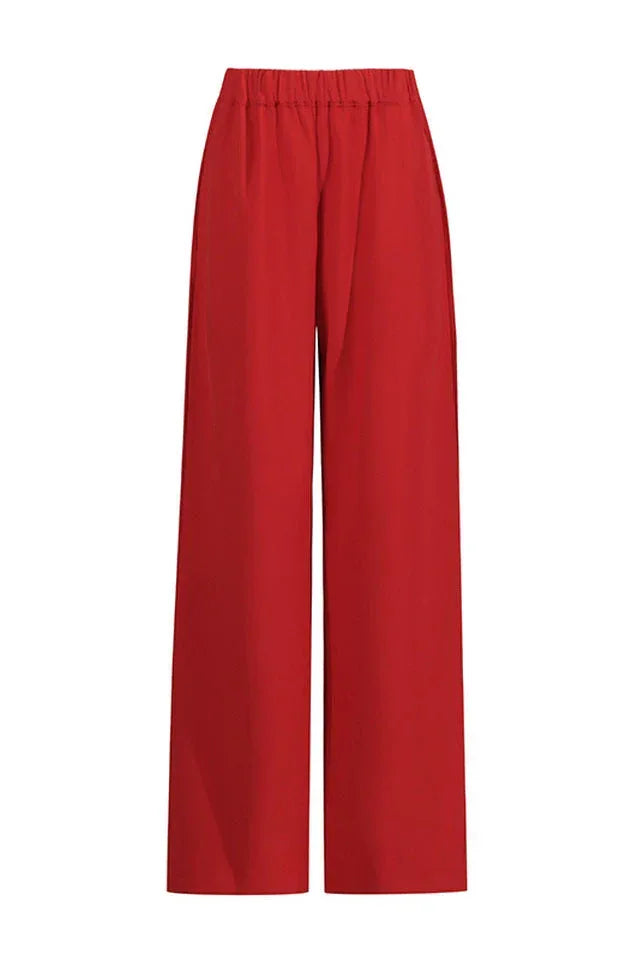 Front view of the red crepe wide leg pants.