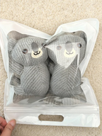 Two gray knit ankle socks with 3D koala appliques, packaged in a clear plastic bag.