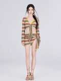 Full body shot of a woman in a crochet knit set with a wrap skirt