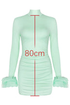 Front view of mint green bodycon mini dress with measurement indicator