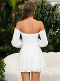 Back view of a woman in a white off-the-shoulder mini dress with lace trim and puff sleeves.
