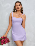 Front view of a woman in a lavender crepe sheath mini dress