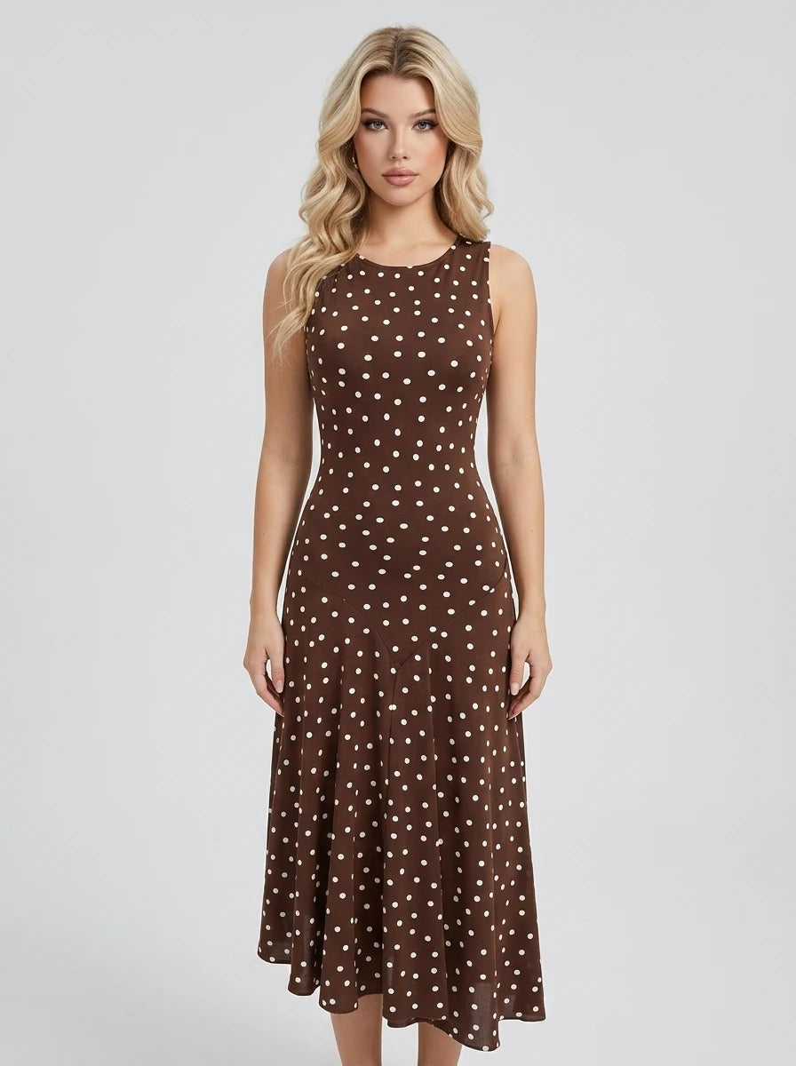 Woman wearing a brown polka dot sleeveless midi dress