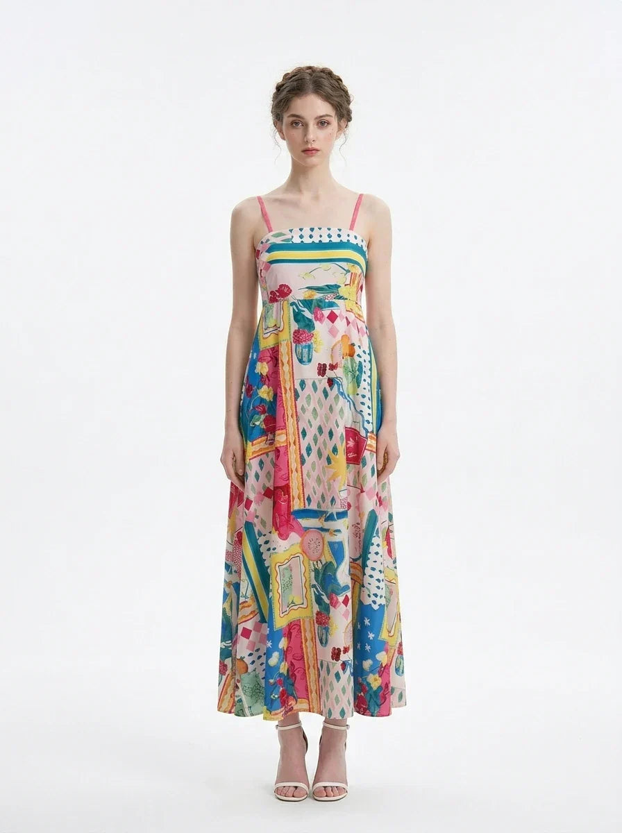 Woman wearing a colorful patchwork print maxi dress with spaghetti straps