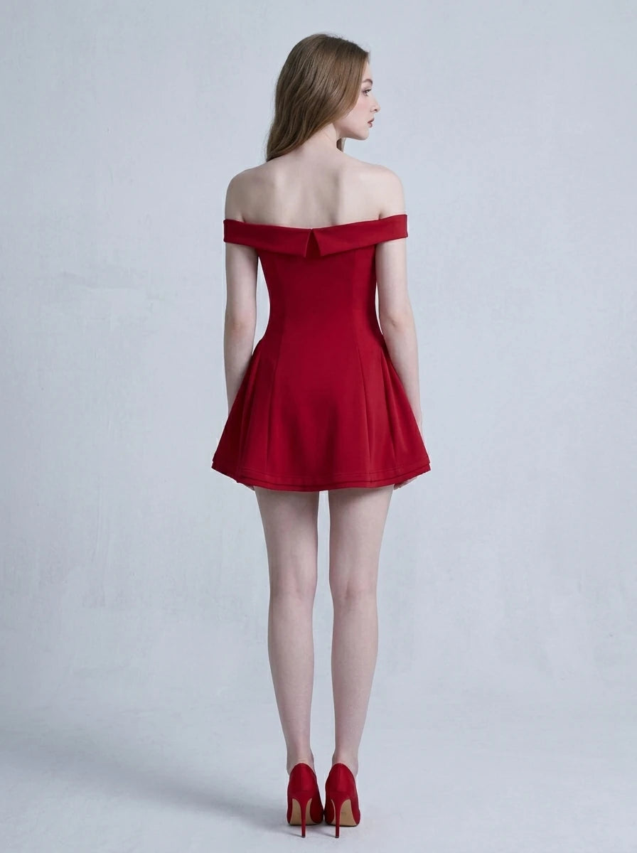 Back view of a woman in a red off-the-shoulder dress