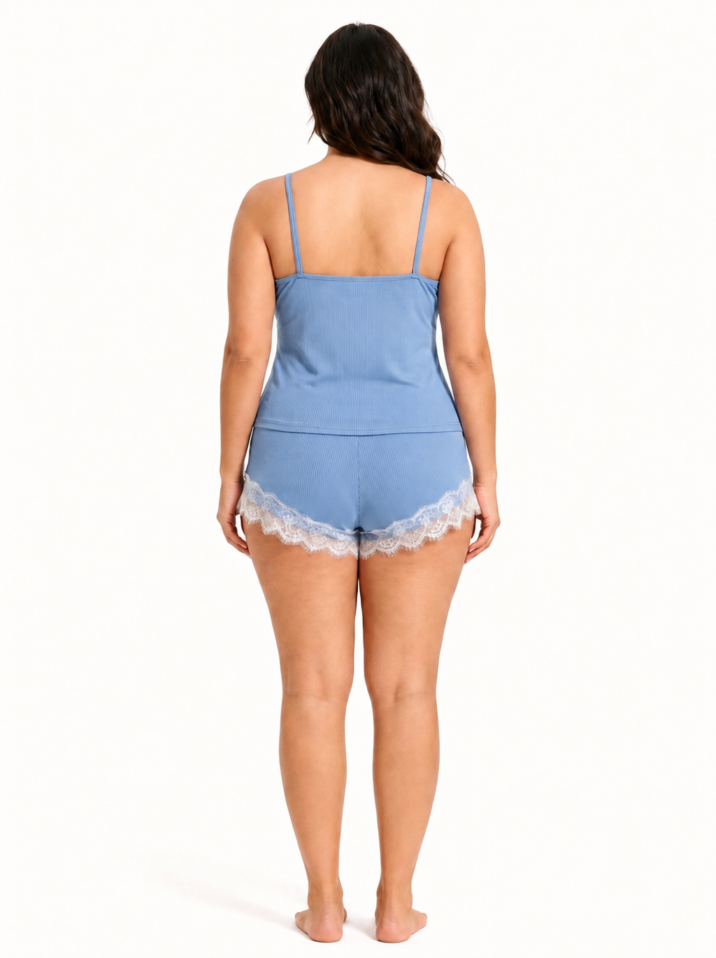 Back view of a woman in a light blue ribbed knit camisole and shorts set with white lace trim.