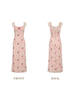 Front view of a pink floral print midi dress with lace trim and a tie detail.