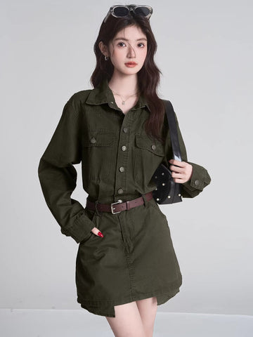 Woman wearing a long-sleeved olive green collared dress with button-down closure and two chest pockets.