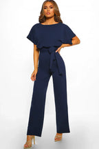 Navy wide leg jumpsuit with tie waist and short sleeves