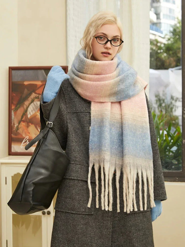 Woman posing with an oversized pastel scarf