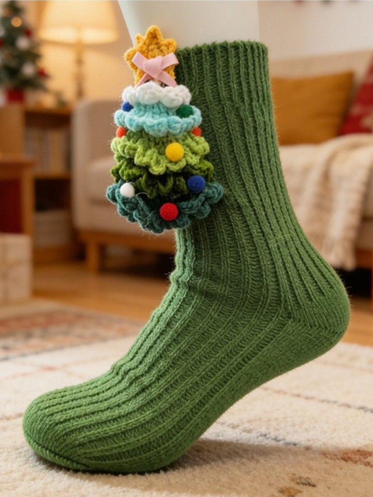 Green crew sock with a 3D crocheted Christmas tree applique and yellow star