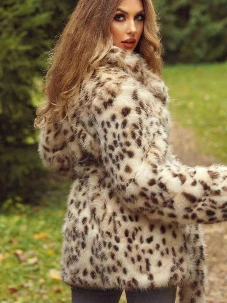 Woman from behind wearing a spotted faux fur coat