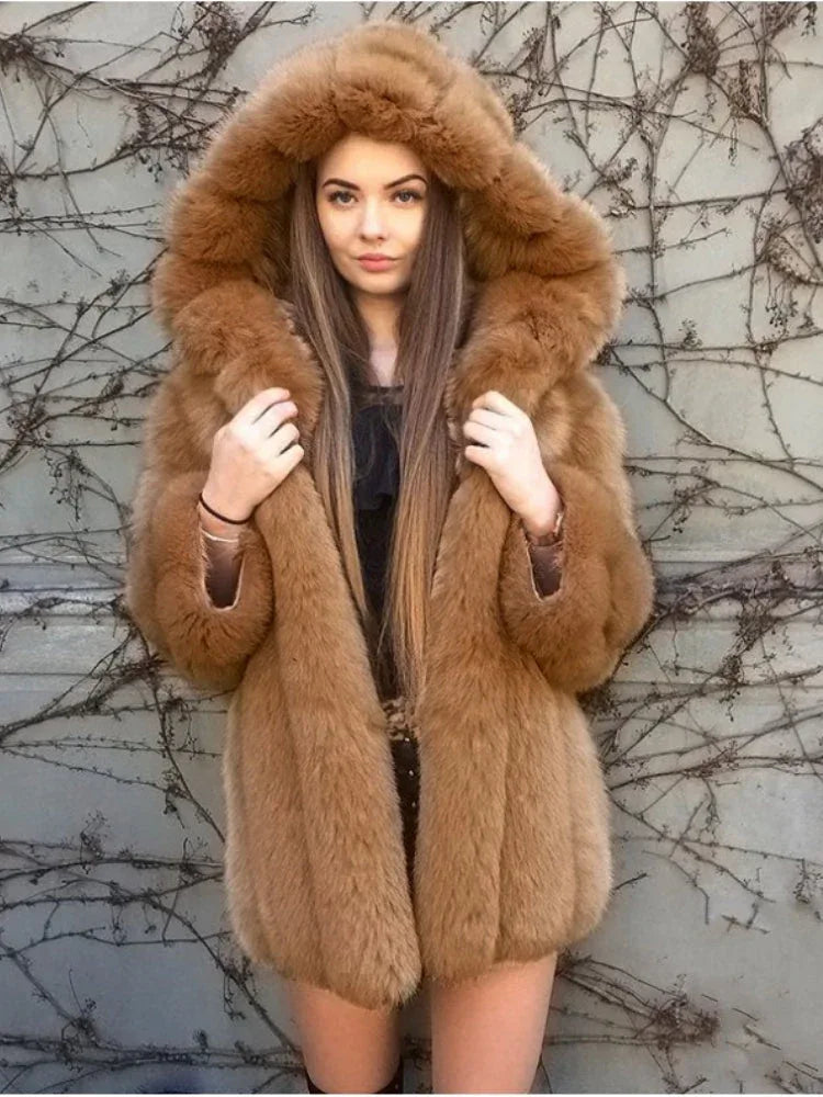 Woman wearing a brown hooded faux fur coat.