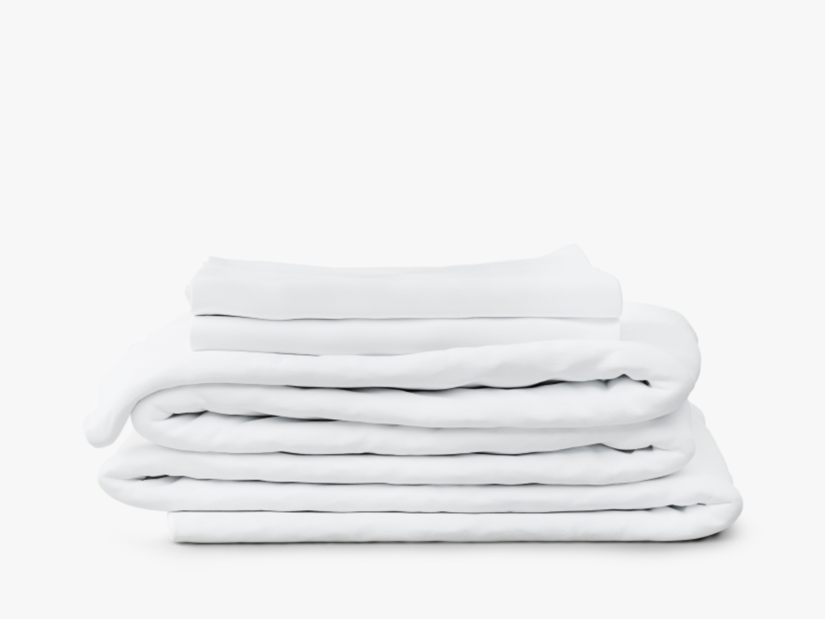 Stack of white folded sheets and a duvet on a white background