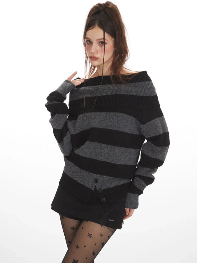 Close-up of a woman wearing a grey and black striped knit sweater styled off-the-shoulder, black shorts, black patterned tights, and black boots.
