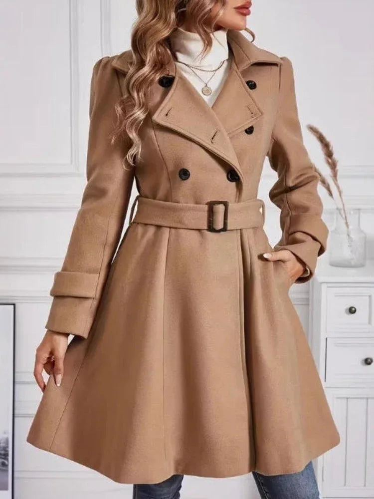 Close-up of a camel double-breasted wool blend coat with notched lapels and button detailing