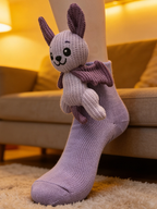 Light purple ankle sock with a light purple and darker purple knitted bat character applique attached to the cuff.
