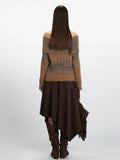 Back view of a woman in a brown and grey gradient off-the-shoulder knit sweater.