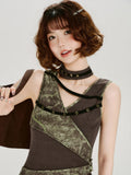 Model winking while wearing the tank top and a star-embellished choker