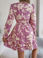 Back view of a mauve purple floral tie-front mini dress