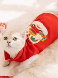 A white cat lying down wearing a red pet Tang suit vest with embroidered details