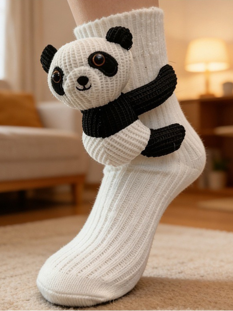White crew socks with a plush 3D panda applique hugging the leg Main image