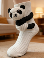 White crew socks with a plush 3D panda applique hugging the leg