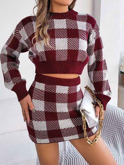 woman wearing a burgundy and white gingham plaid knit cropped sweater and mini skirt set with a white handbag