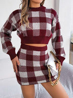 woman wearing a burgundy and white gingham plaid knit cropped sweater and mini skirt set with a white handbag