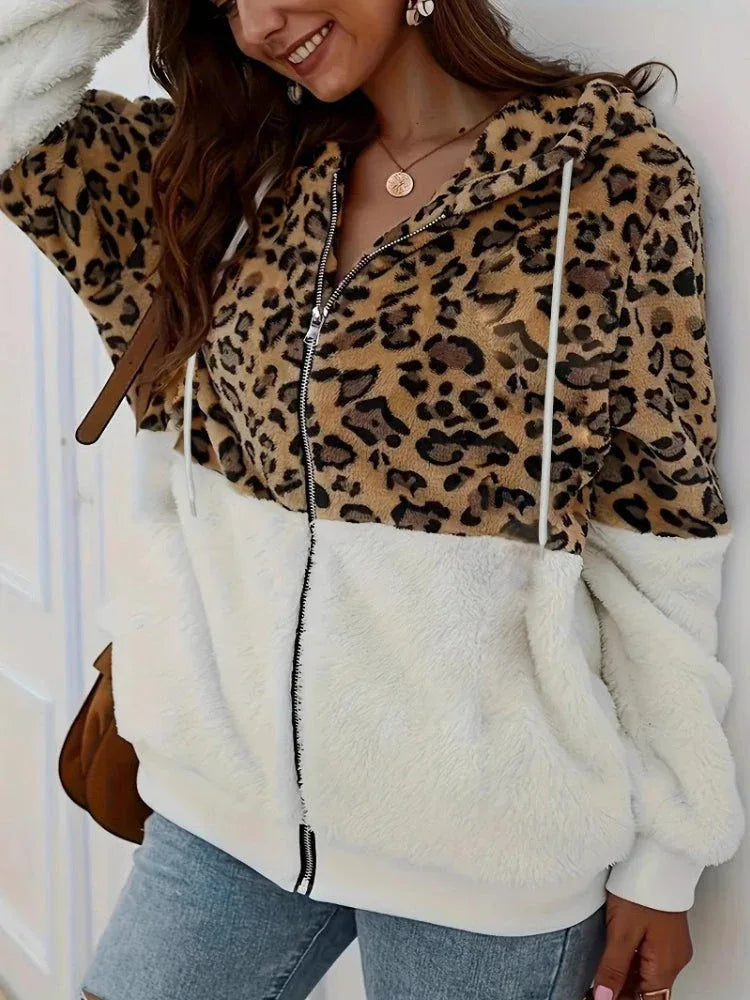 Close-up of the leopard print and fuzzy white fabric on the hooded jacket