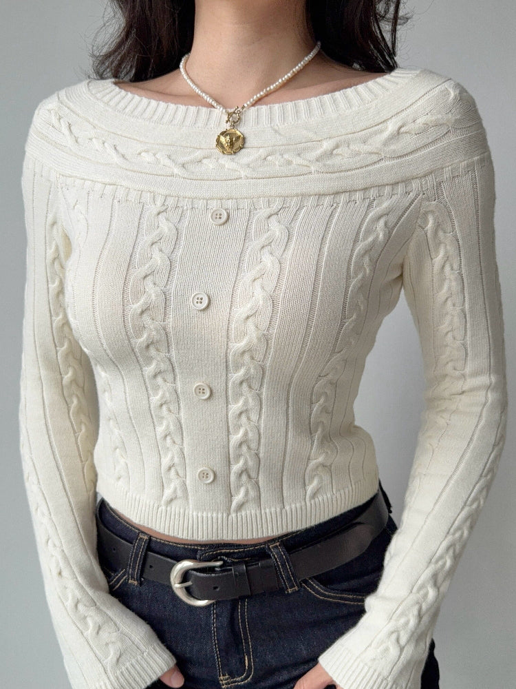 Cream cable knit cropped sweater with off-the-shoulder neckline and button detail